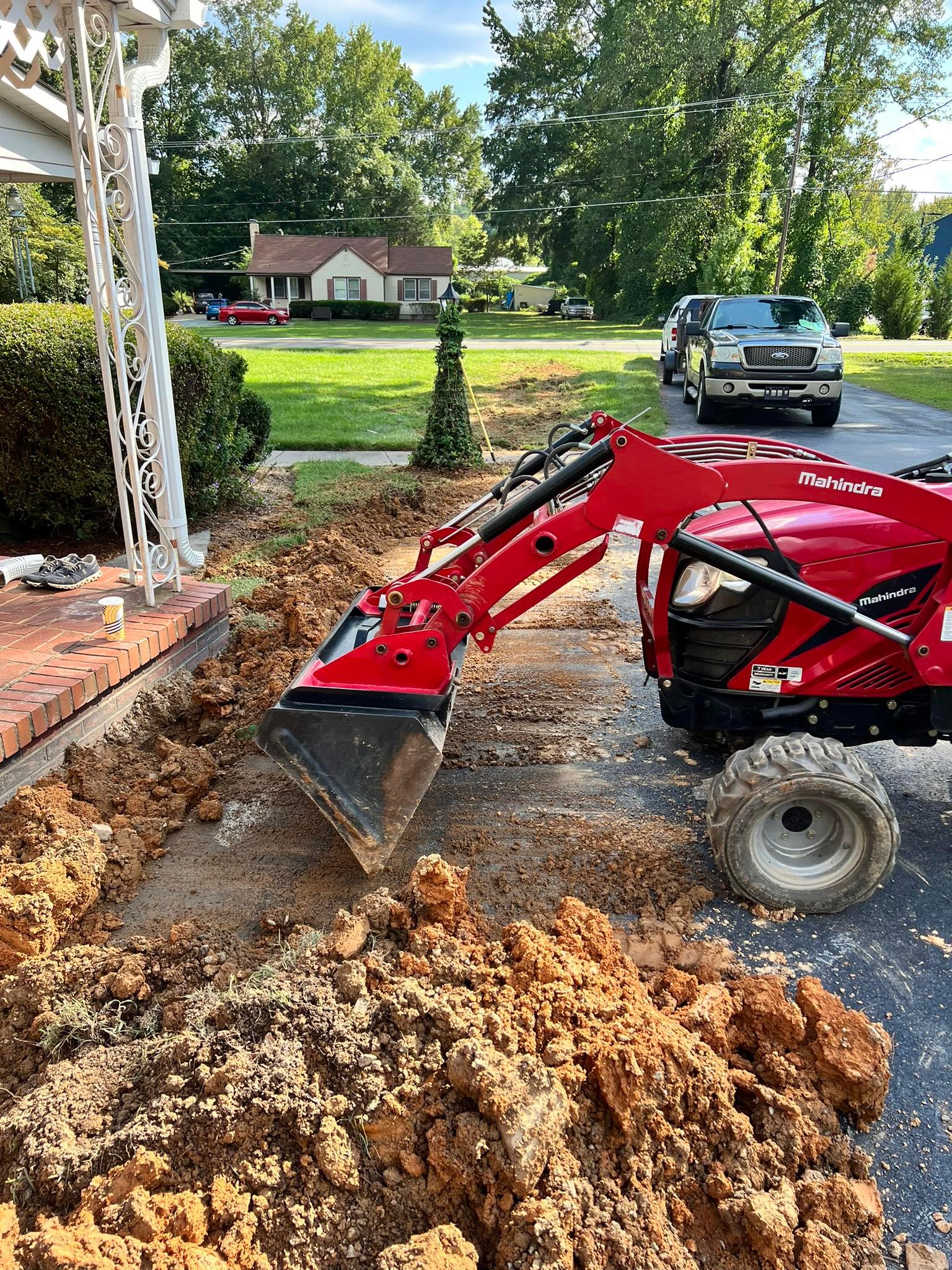 excavator digging a trench